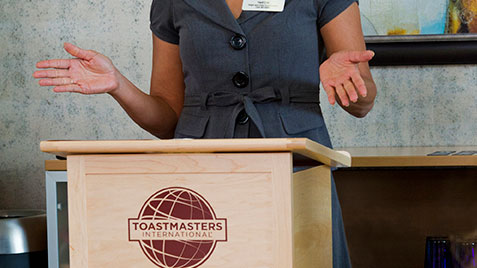 Photo of Toastmasters lectern and speaker